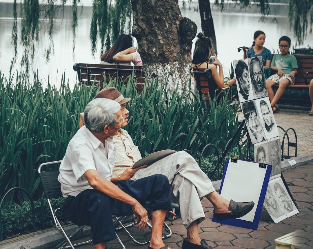 elderly couple reading documents